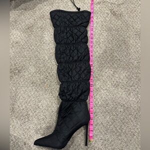 Steve Madden black puffy boots. Brand new never worn.